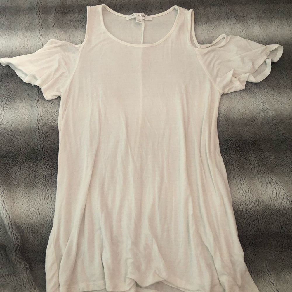 White open shoulder shirt